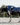EQUIDRY waterproof horse riding raincoat thin fleece pro ride reflective in navy children's rider on horse with exercise sheet