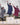 Evolution Pro women's Warm Waterproof Horse Riding Coat Thick Fleece Lining Stowaway Hood in Plum 3 riders on podium after show