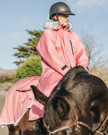 EQUIDRY Evolution Lux Women's Warm Waterproof Winter Horse Riding Coat Thick Fleece Lining with Faux Fur Trim Hood dusky pink on horse 