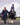 EQUIDRY women's long waterproof horse riding coat in Dark Navy/Cream group image of girls walking on horseback to have riding lesson 